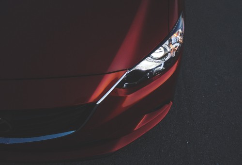 Image red car with white and blue light