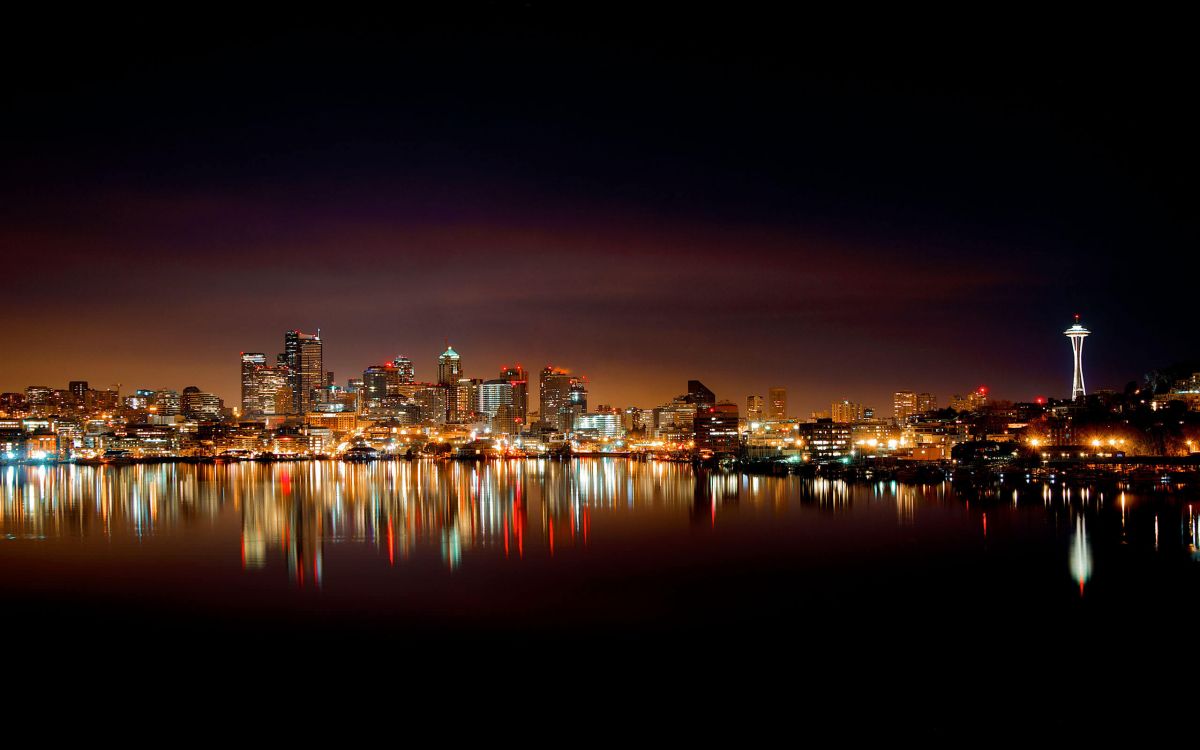 city skyline during night time