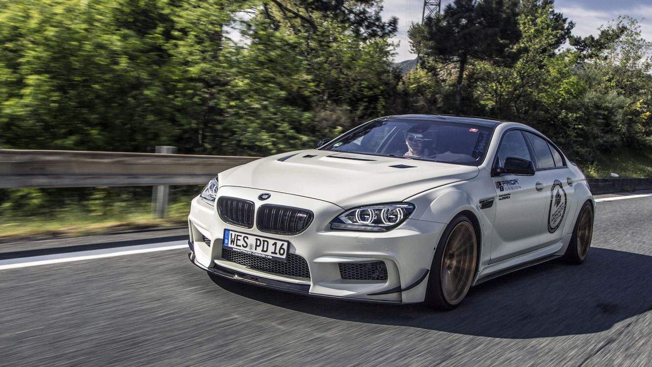 silver bmw m 3 on road during daytime