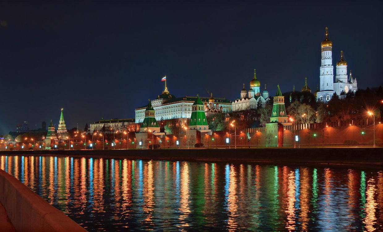 city skyline during night time