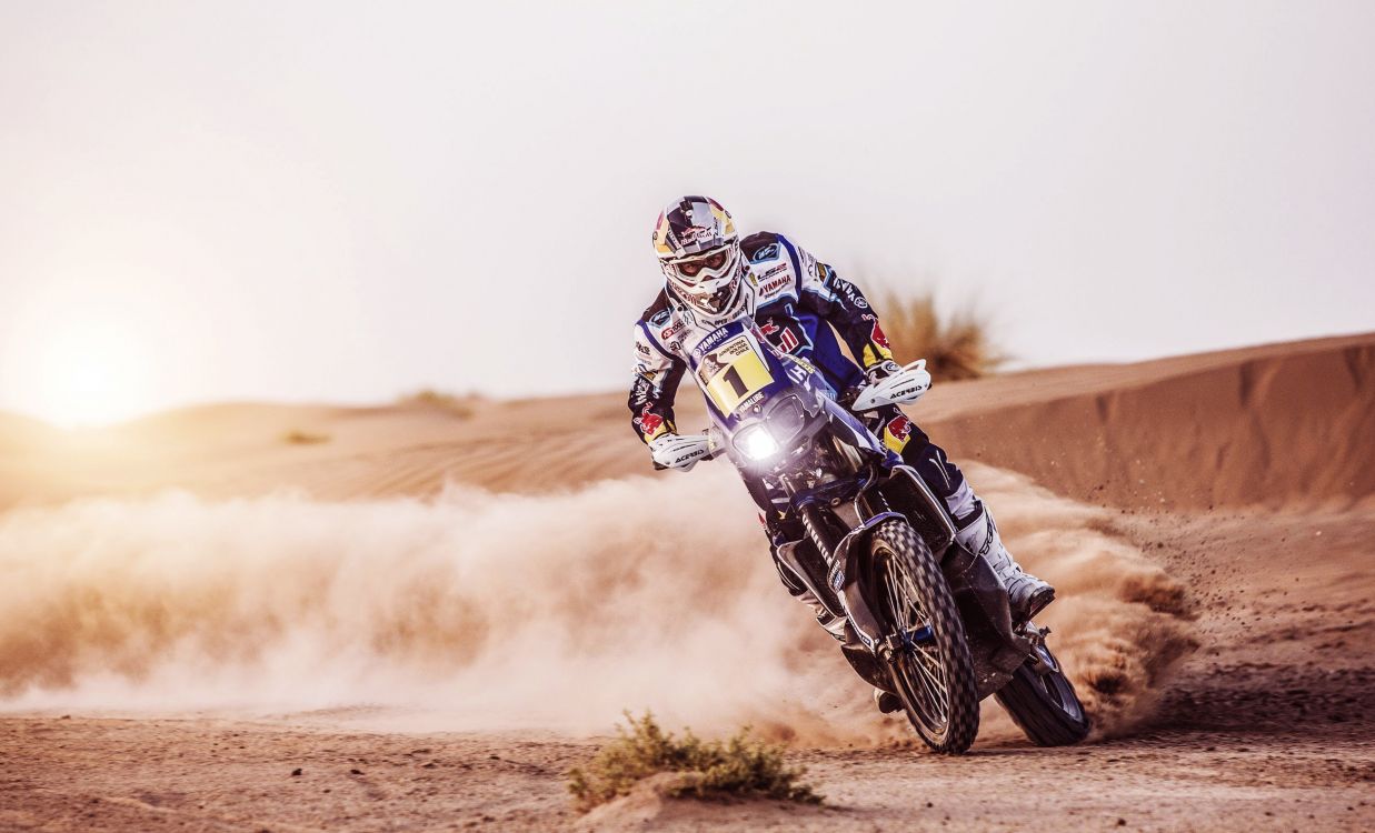 man riding motocross dirt bike