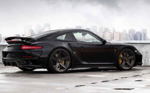 Image black coupe on gray asphalt road during daytime