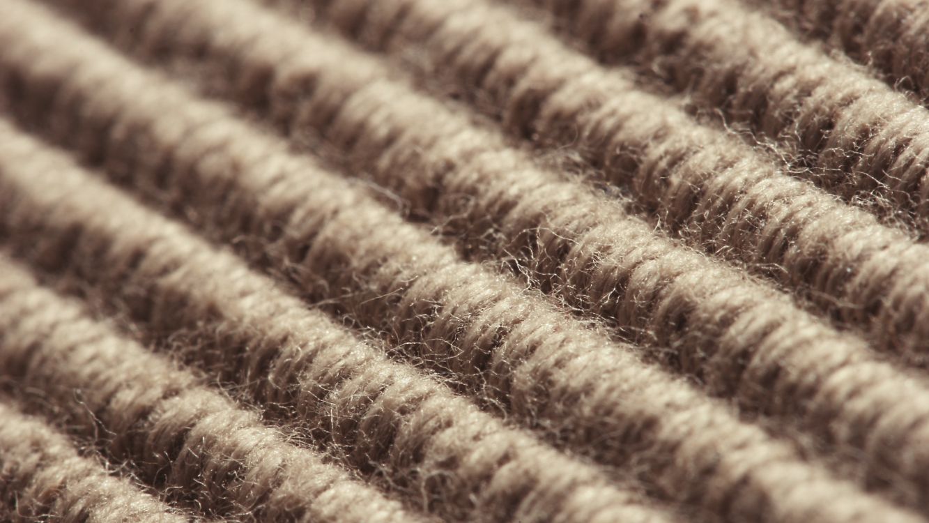 brown and white striped textile