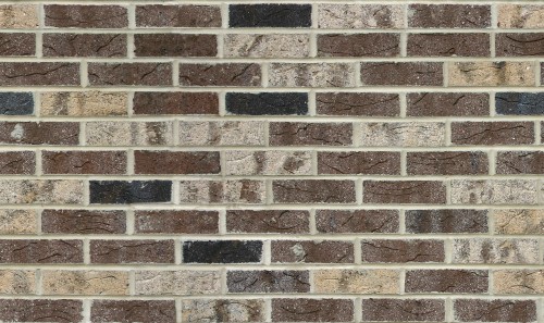 Image brown and black brick wall