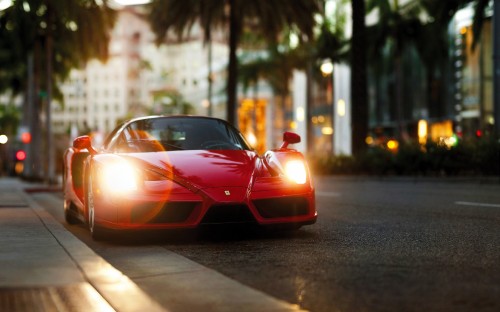 Image red ferrari sports car on road during daytime