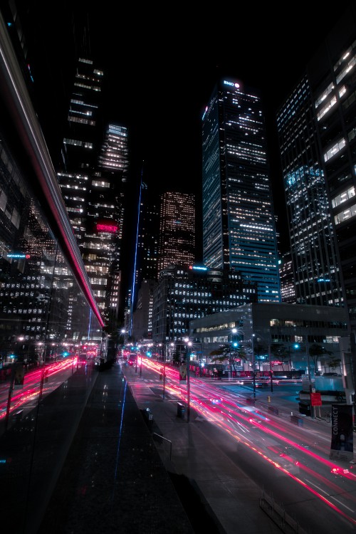 Image cars on road in city during night time