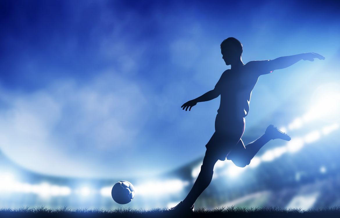 Man in Black Shorts Playing Soccer Ball. Wallpaper in 6400x4100 Resolution