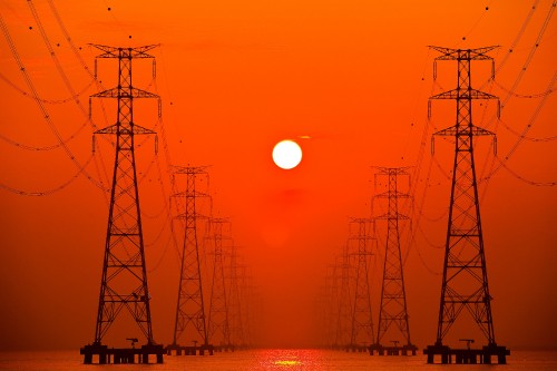 Image silhouette of electric tower during sunset