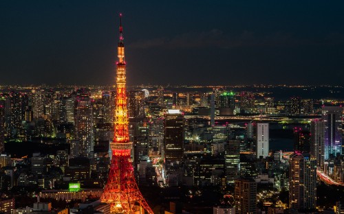 Image red and black tower during night time