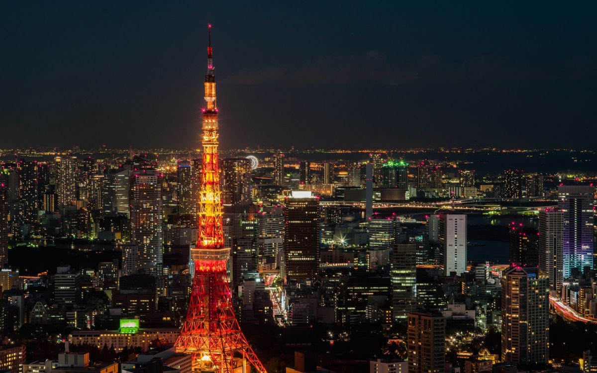 red and black tower during night time