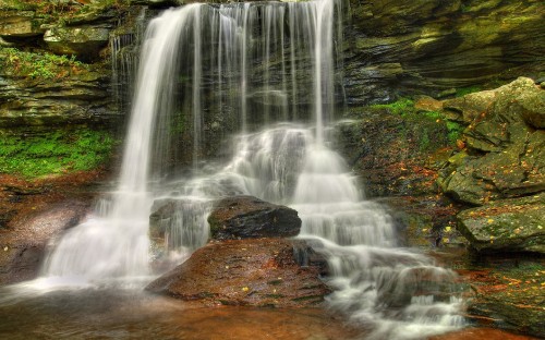 Image water falls on brown rock