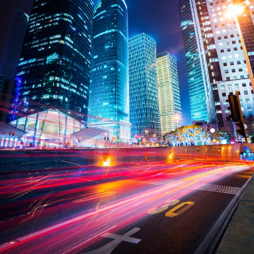 Image time lapse photography of city buildings during night time