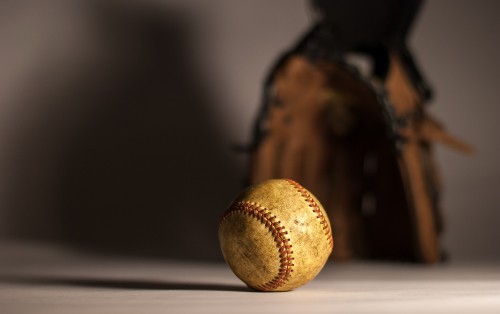 Image brown baseball on brown wooden table