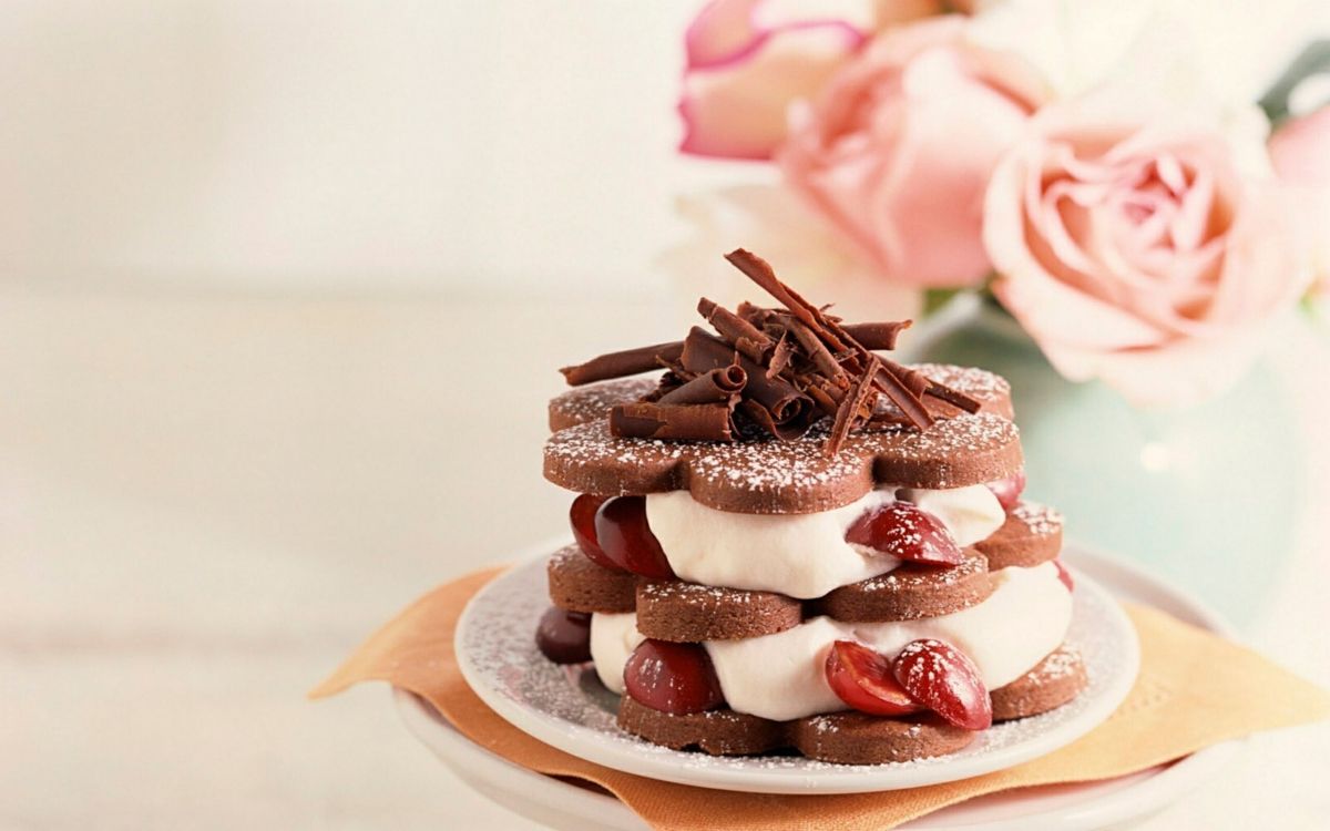 brown and white cupcakes on white ceramic plate