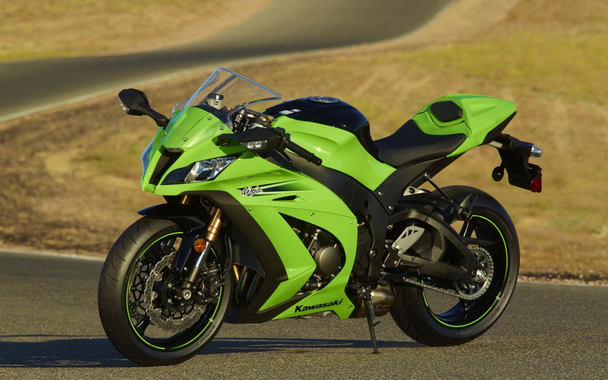 green and black sports bike