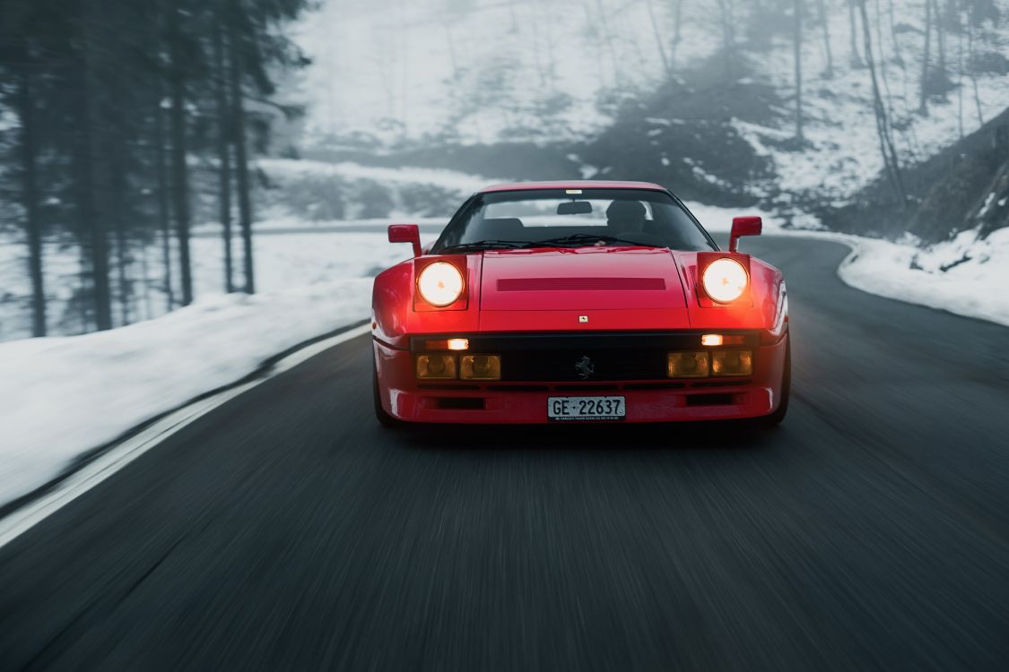 red porsche 911 on road during daytime