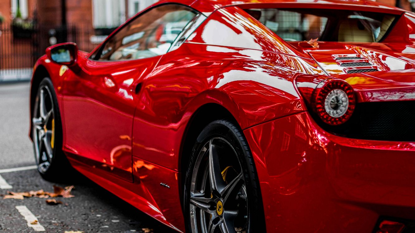 red ferrari 458 italia on road