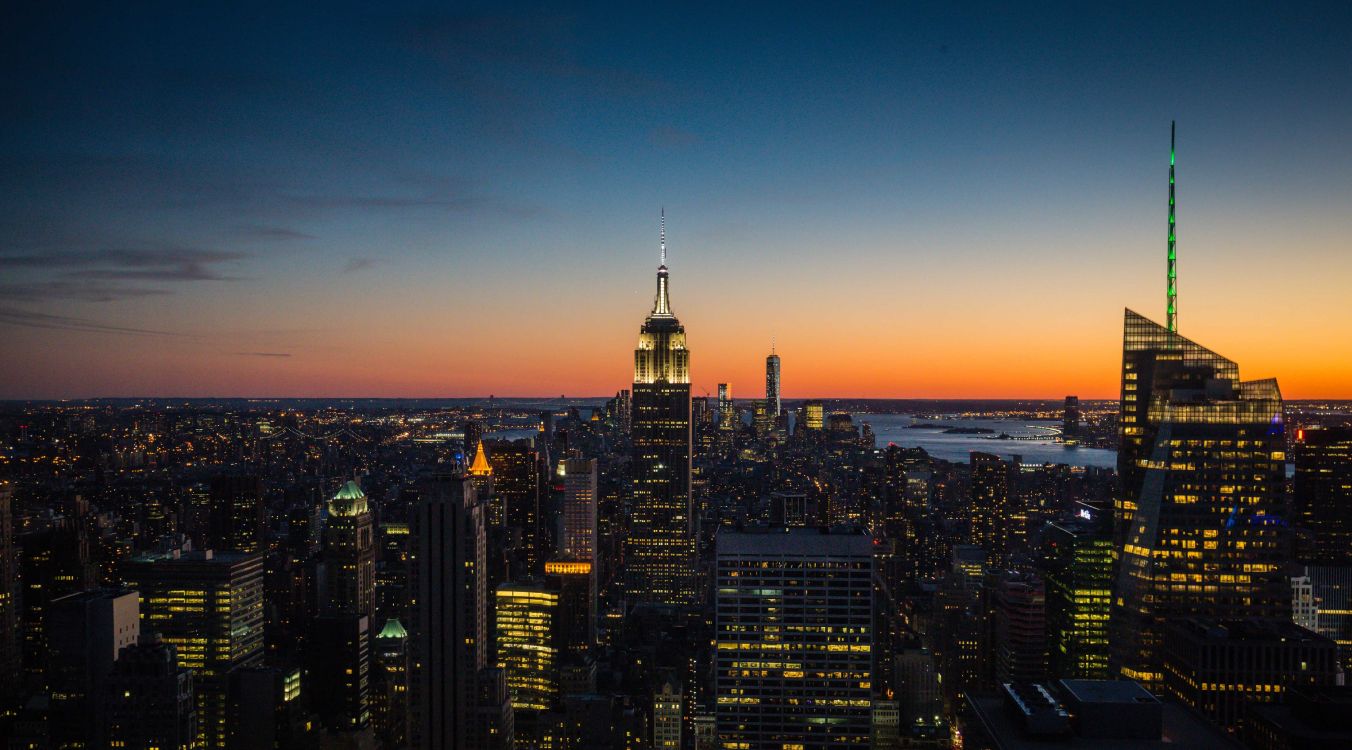 city skyline during night time