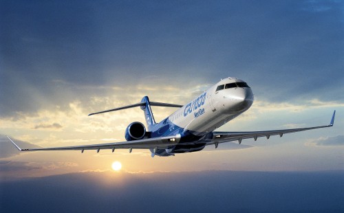 Image white and blue passenger plane in flight