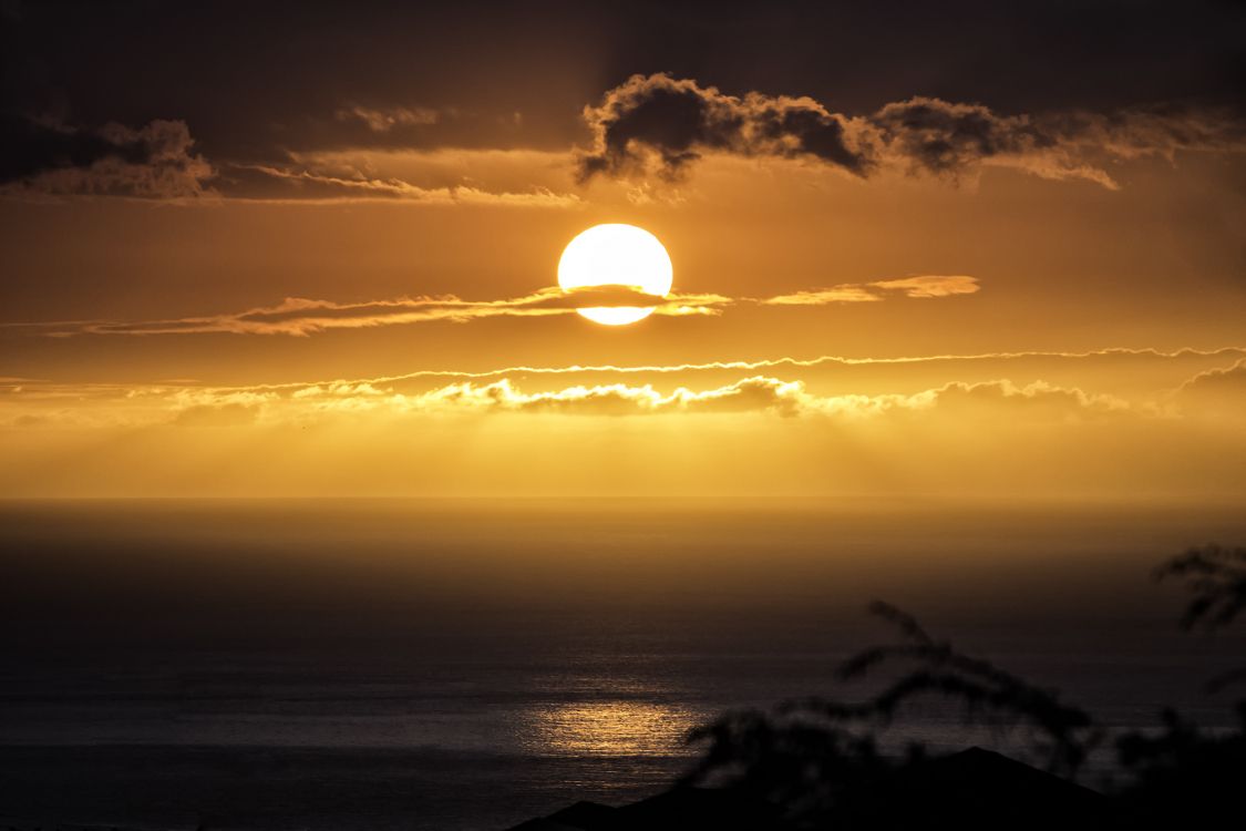 sun setting over the ocean