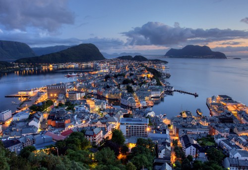 Image city near body of water during night time