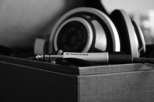 Image black and white headphones on brown box