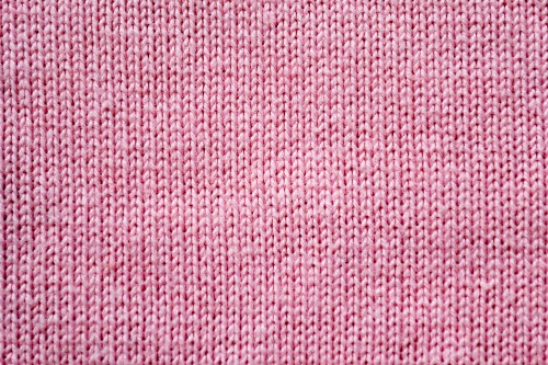 Image red and white knit textile