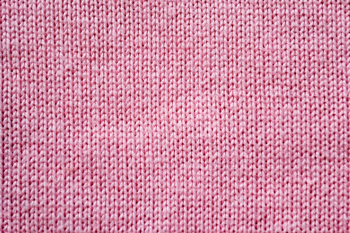 red and white knit textile