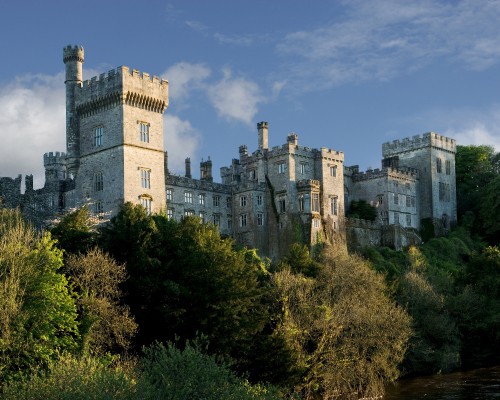 Image gray concrete castle under blue sky during daytime