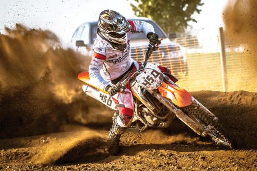 Image man riding motocross dirt bike