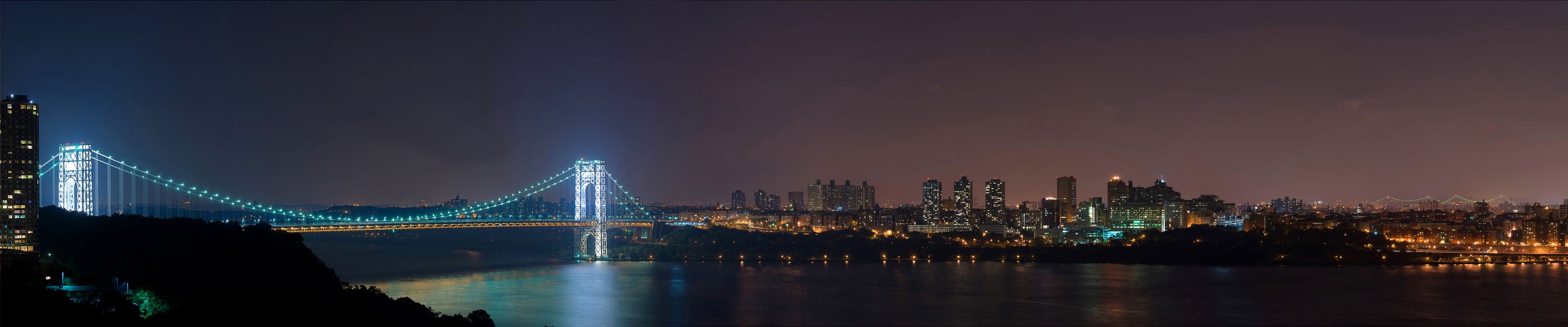 city skyline during night time