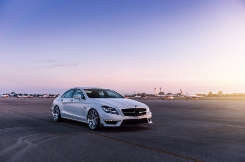 Image silver mercedes benz coupe on road during sunset