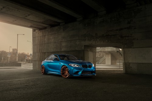 Image blue bmw m 3 coupe parked on gray concrete road