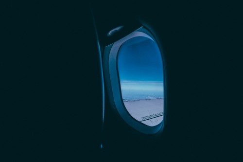 Image airplane window view of white clouds during daytime