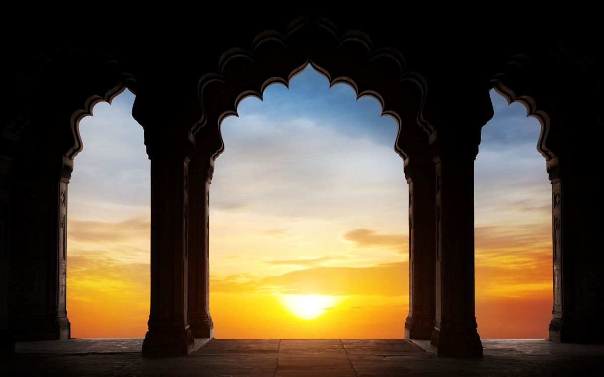 silhouette of building during sunset