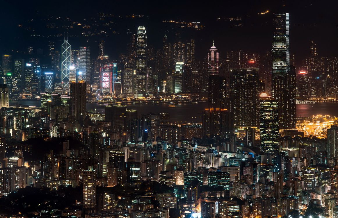 city skyline during night time