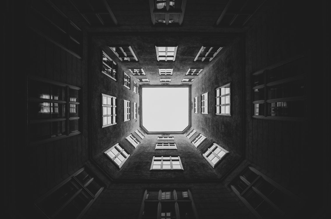 grayscale photo of building interior