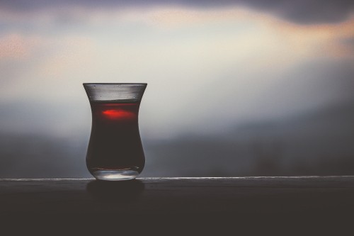 Image clear shot glass with red liquid