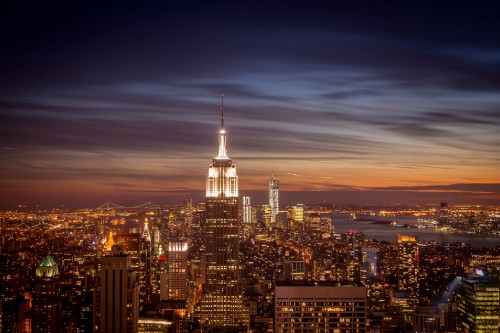 Image aerial view of city buildings during night time