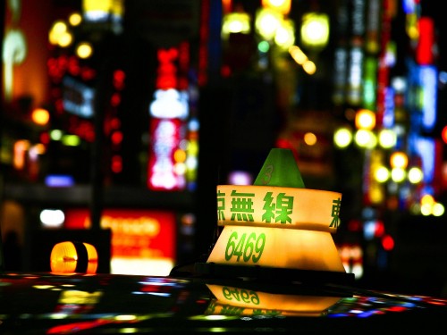 Image yellow taxi cab on street during night time