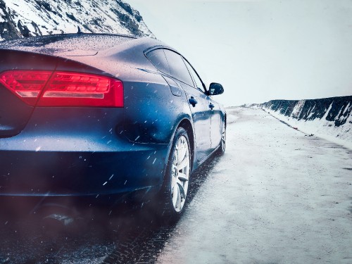 Image red ferrari 458 italia on snow covered ground