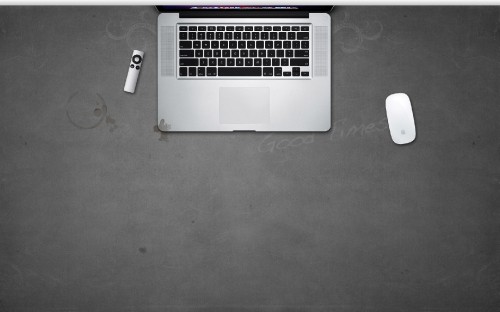 Image macbook pro beside white apple magic mouse