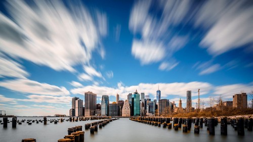 Image city skyline under blue sky during daytime