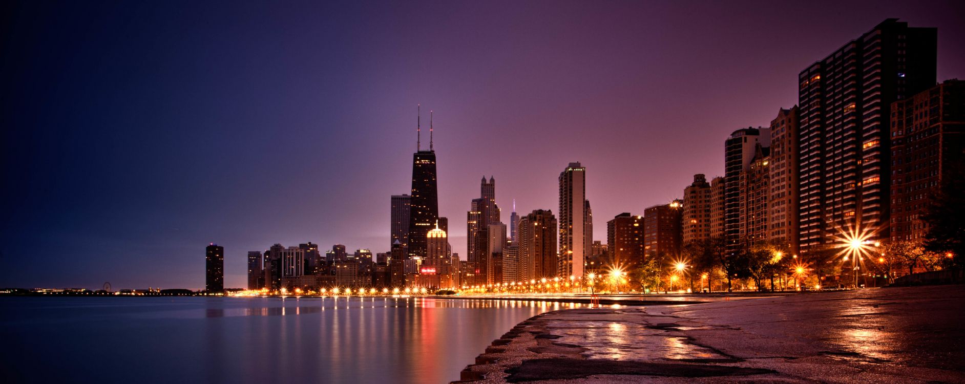 city skyline during night time