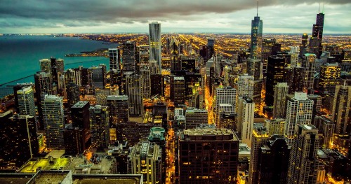 Image aerial view of city buildings during night time