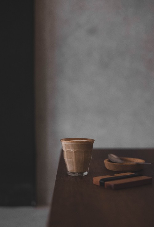 Image brown wooden chopsticks on brown wooden chopping board