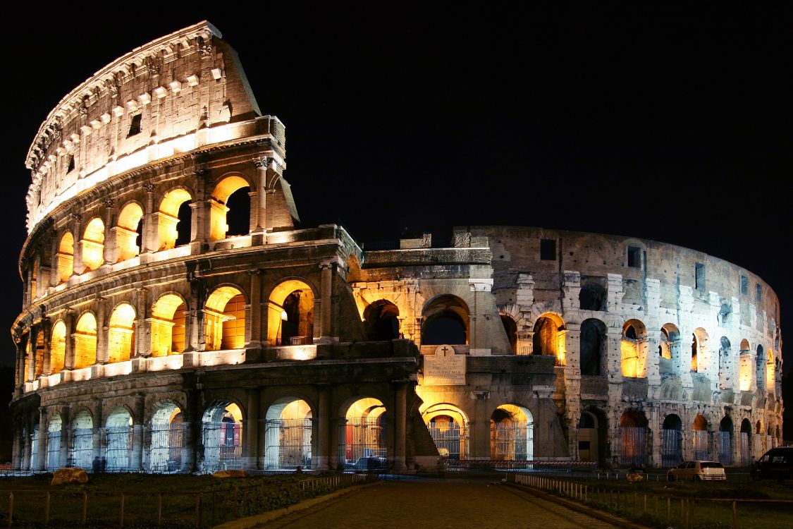 brown concrete building during night time