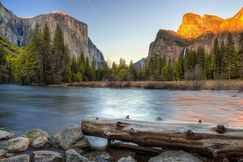 Image brown rocky mountain beside river during daytime