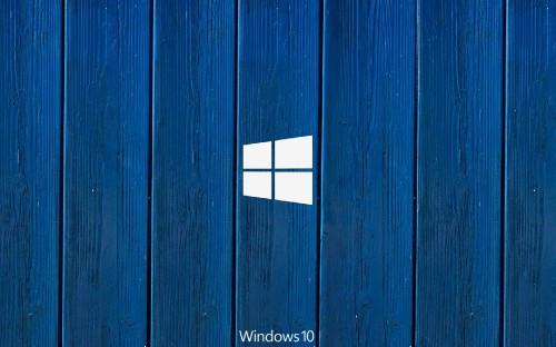 Image blue wooden door with white and red cross