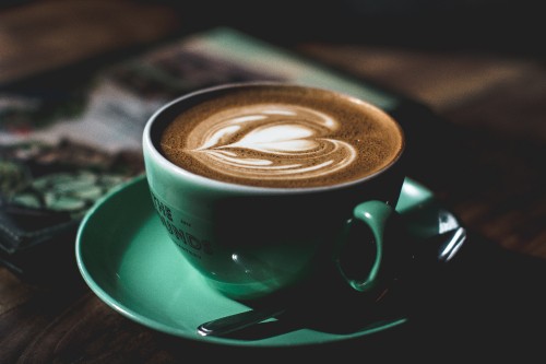 Image green ceramic cup with saucer